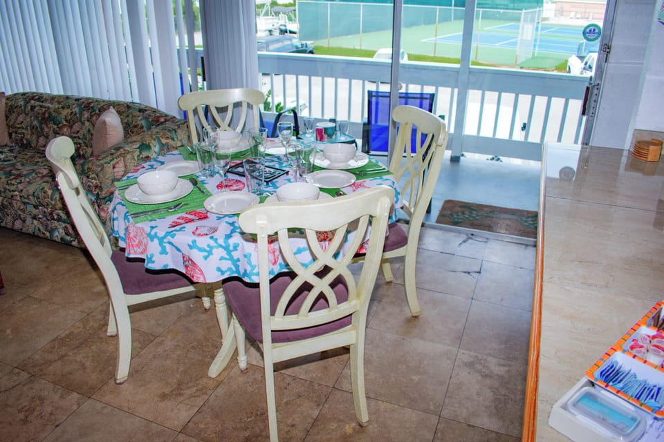 Dining Room Area complete with full silverware and dining sets
