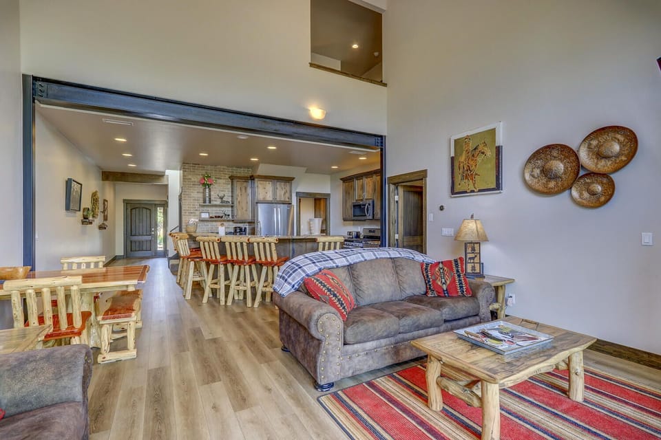 This open concept living/dining space is perfect for hosting or relaxing with a glass of wine and your favorite show.