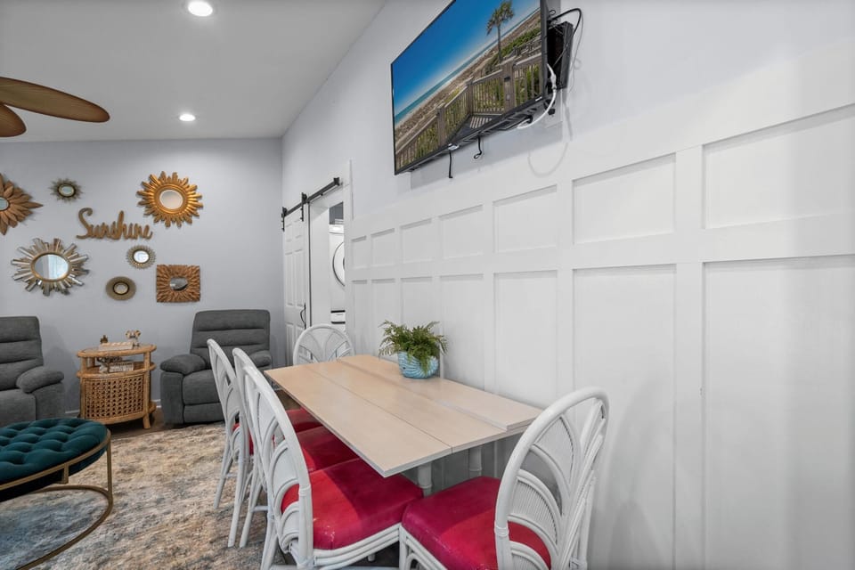 Bright dining area with coastal charm and modern comfort