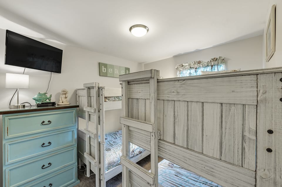 Guest Bedroom with Two Sets of  Twin Size Bunk Beds, Smart TV and DVD Player