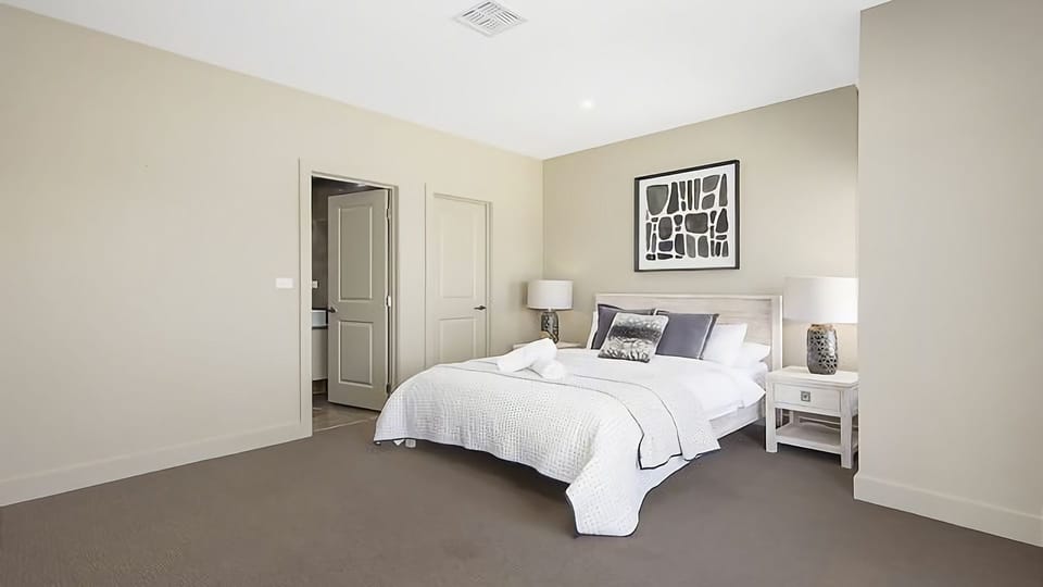 Embrace the luxury of our master bedroom with a queen bed and ensuite, where every detail is meticulously designed to ensure your utmost comfort and relaxation.