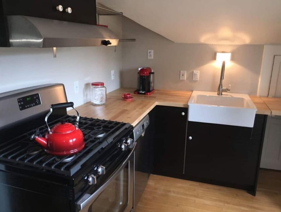 IKEA kitchen. Microwave, BUNN coffee maker, toaster, BOSCH dishwasher. 