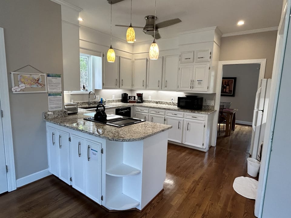 Open, full Kitchen looks out onto Breakfast Nook so the conversations can continue while preparing a meal.