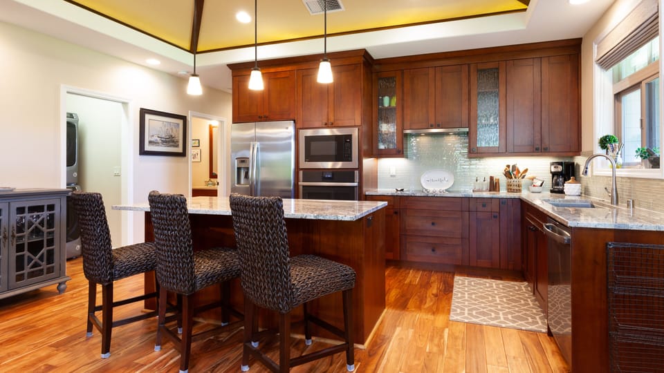 Gourmet kitchen stocked with spices, oils, and  cooking essentials. Perfect for preparing delicious island inspired meals