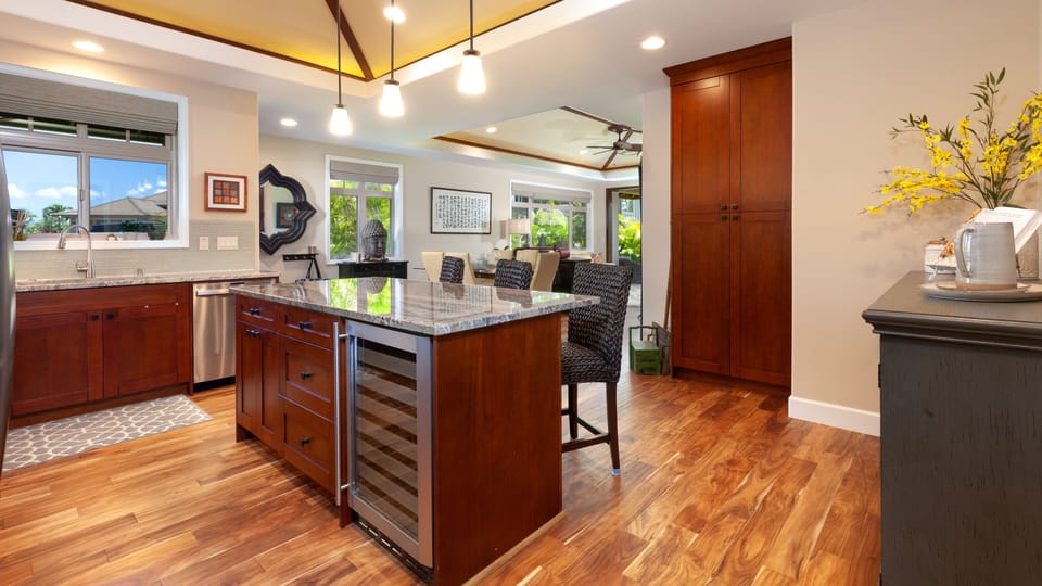 Gourmet kitchen with wine chiller, and additional island seating for 3