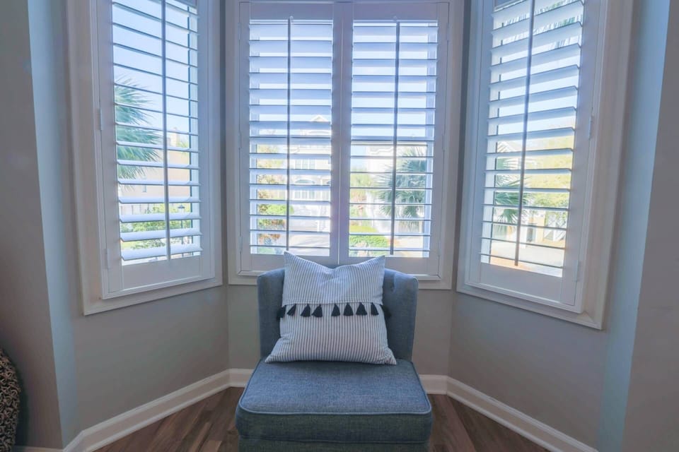 This ground floor guest bedroom looks out over the front side of the home.