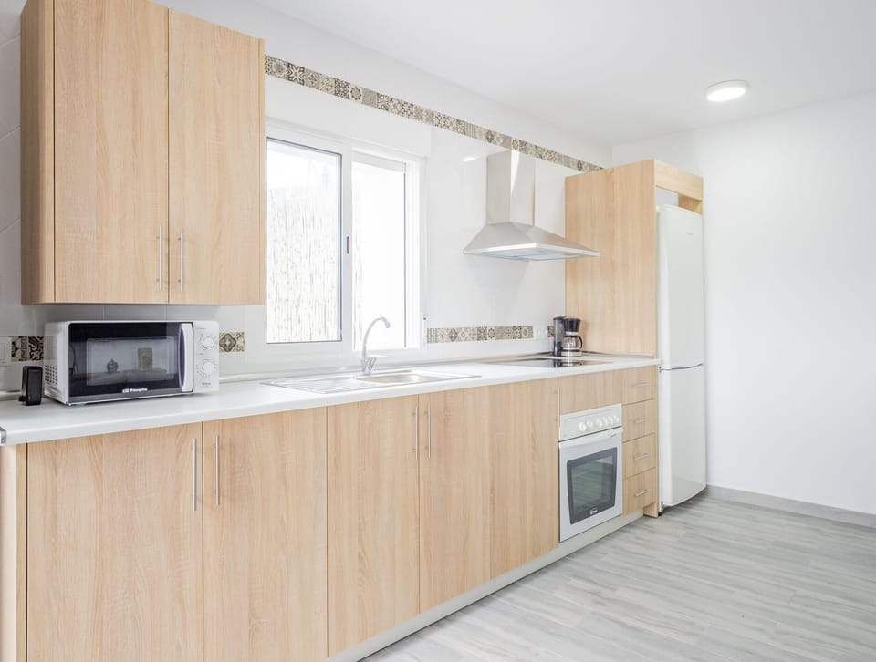 Enjoy the kitchen of this rural house in Cártama