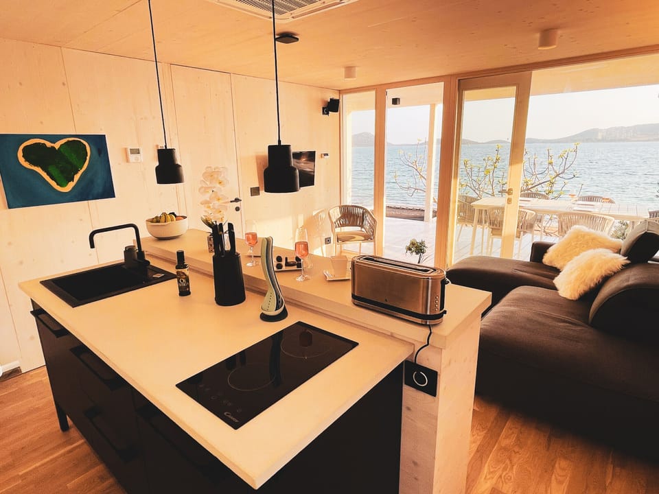 At the back of the house is the kitchen, from there you also have an unbelievable view of the sea outside, just like anywhere else.
