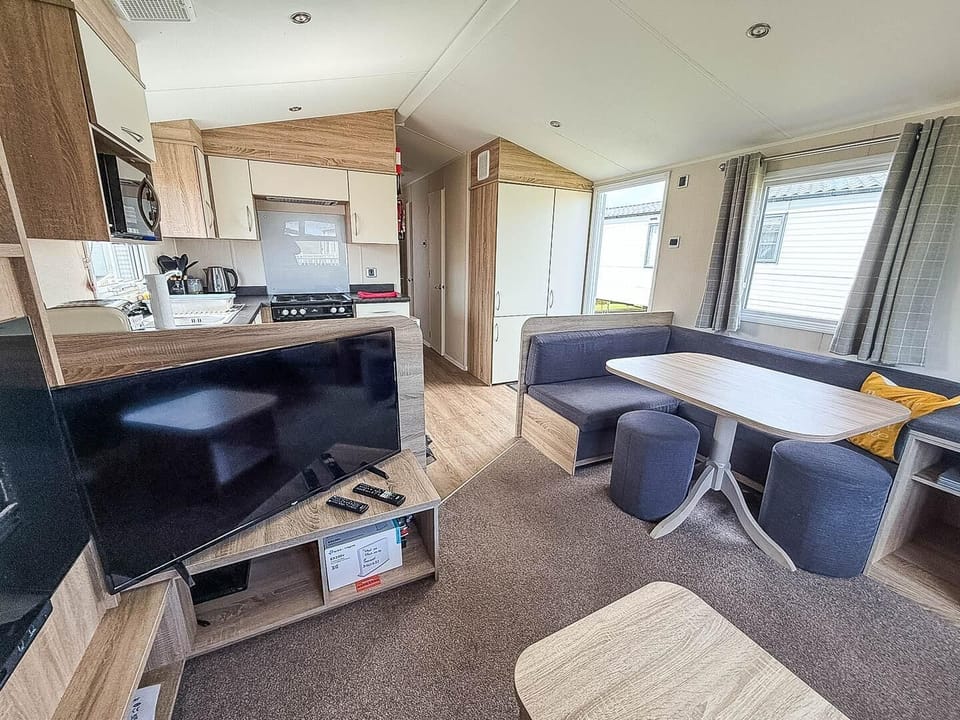 Enjoy a bank holiday getaway near Great Yarmouth Norfolk, where you can relax in the living room in a caravan at Park Holidays Broadland Sands after exploring the many things to do in Great Yarmouth.
