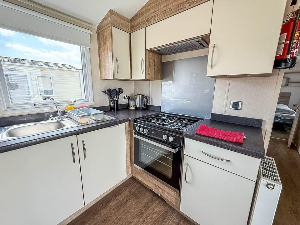 A caravan holiday at Broadland Sands Holiday Park Lowestoft combines the comforts of home, like a comfortable kitchen area, with the beauty of Suffolk beaches UK and Lowestoft beach Suffolk.
