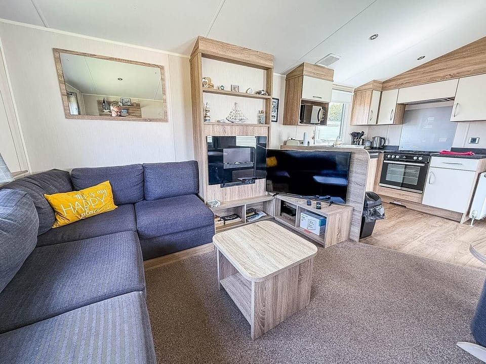 For a staycation UK, choose a static caravan holiday in Great Yarmouth Norfolk, where the living room in a caravan offers the perfect spot to relax after a fun-filled day at the Pleasure Beach Great Yarmouth.