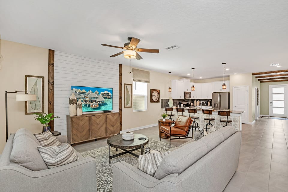 Spacious Living Area of the Home in Reunion Florida - Offers comfort and style - With plush furnishings and a welcoming ambiance - Smart TV and Netflix
