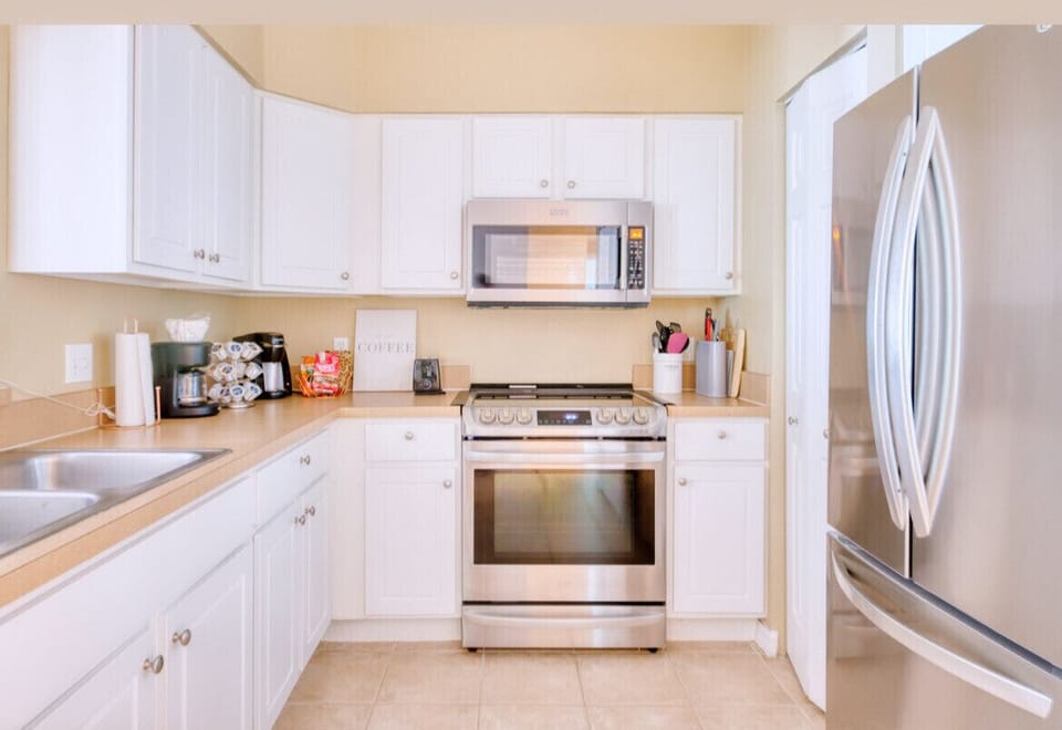 Full kitchen with new stainless steel appliances for your cooking needs 