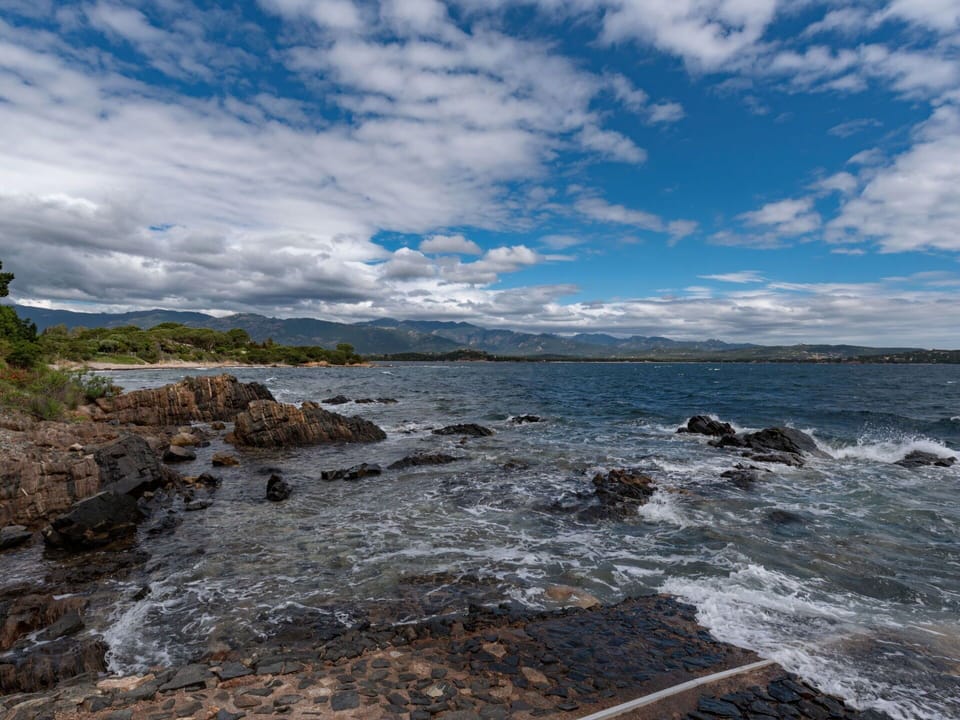 Cloud, Sky, Water, Natural Landscape, Plant, Tree, Highland, Coastal And Oceanic Landforms, Watercourse, Cumulus