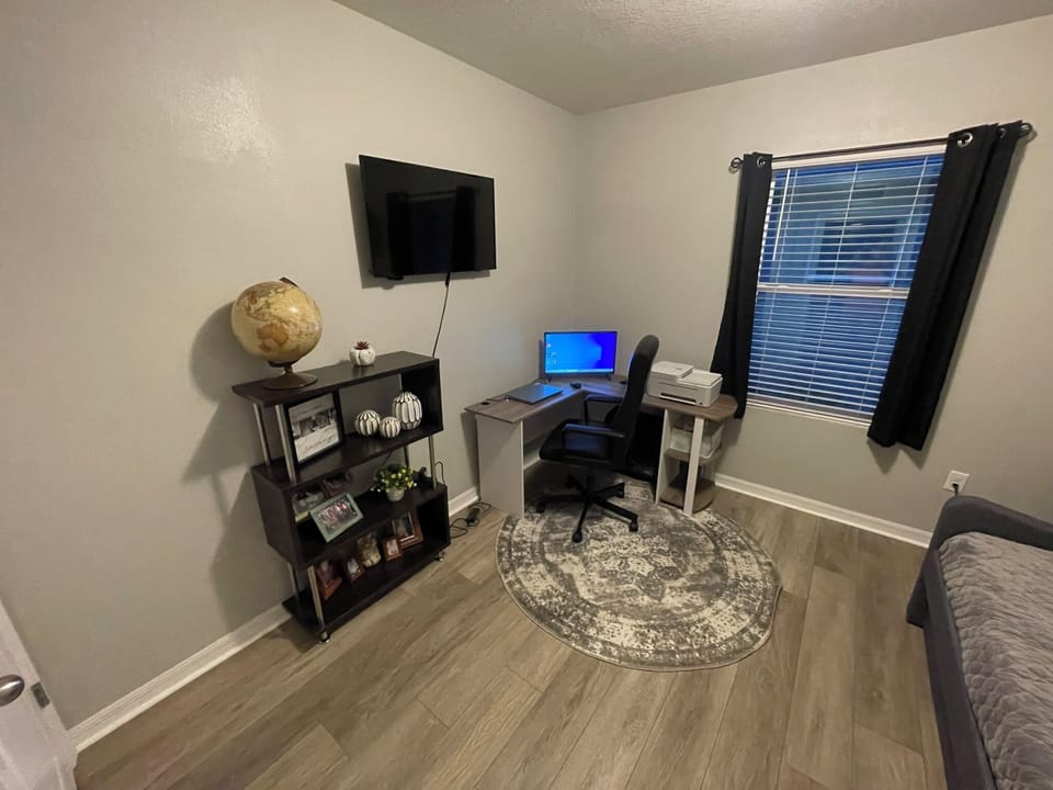 Bedroom 4: office desk and Roku TV