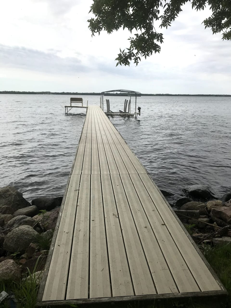 ShoreStation dock with bench & boat hoist.  