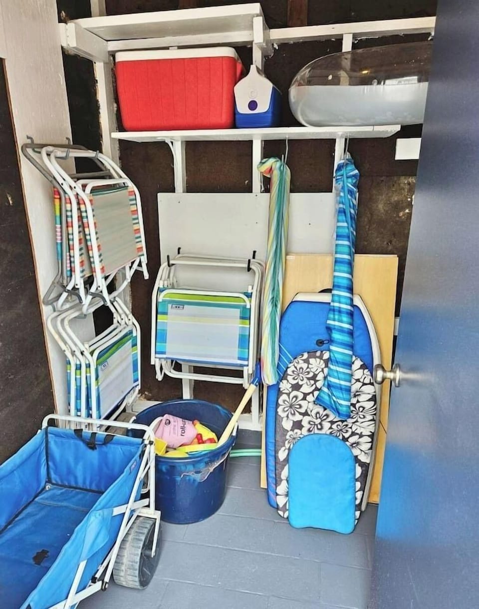 Save space in your car! We provide the essentials for a perfect day at the shore, including several folding beach chairs, beach umbrellas, a boogie board, and a handy cart to haul it all down to the sand.