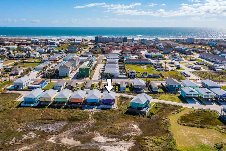 Located a short walk or even shorter golf cart ride to the beach.