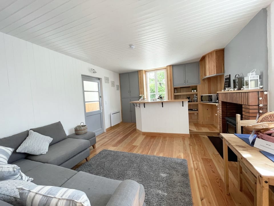 Enjoy this spacious light kitchen, living, dining room.