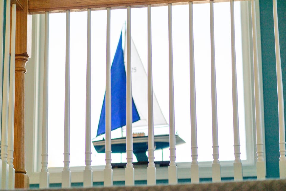 Sailboat off stairs to 2nd floor.