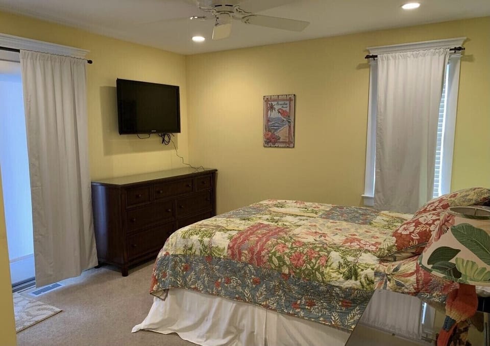 Bedroom with first floor ocean-side deck access.