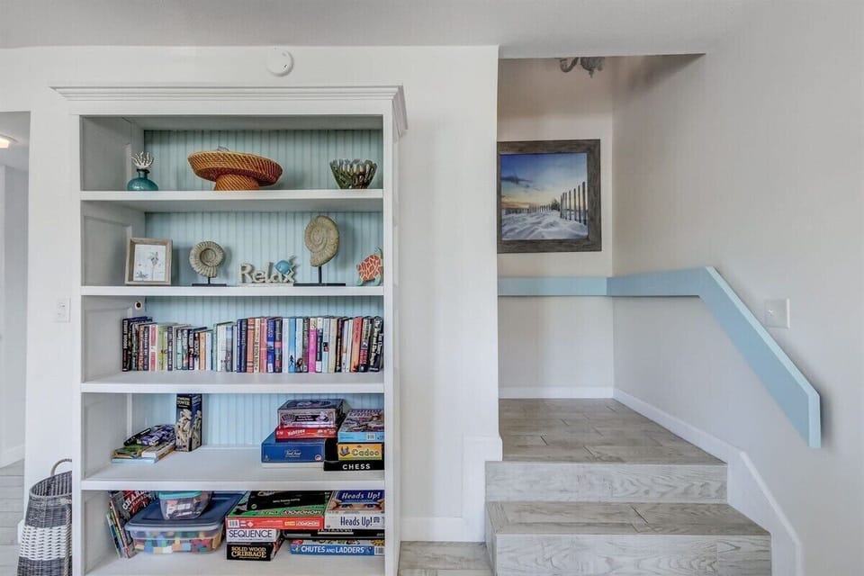 Books and Games Await! Stairs Leading to Bedrooms