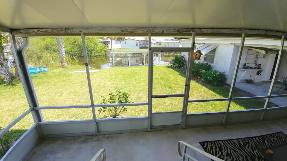screened back patio on the water