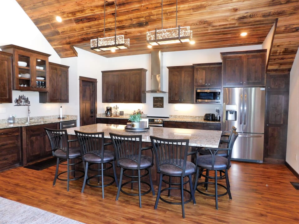 Large kitchen island with beautiful kitchen.