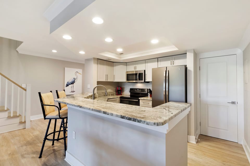Open Layout Kitchen Connecting It with the Living Room