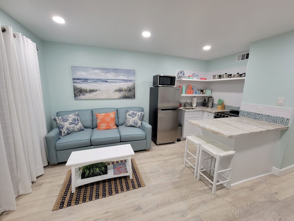 Open living, dining, kitchenette