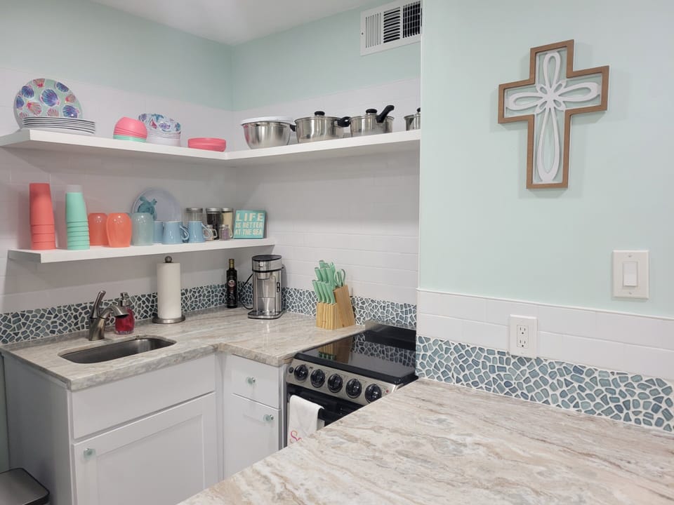 Custom granite counters and custom glass backsplash 