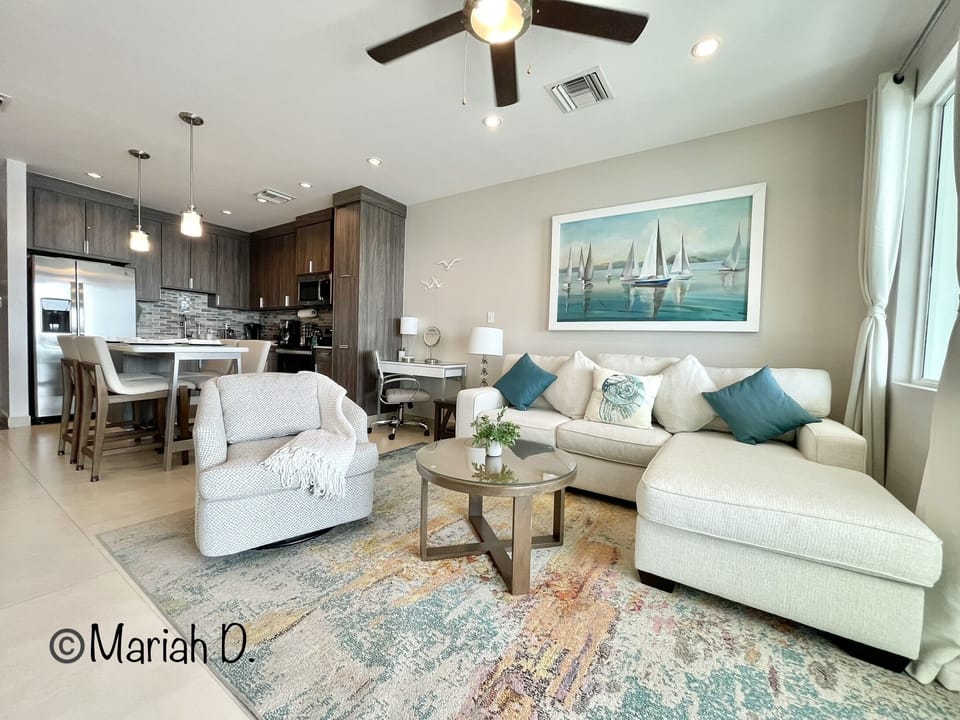 Living area with queen sleeper sofa.