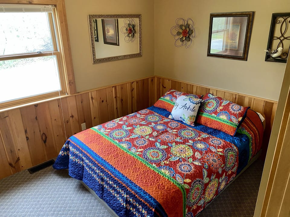 Second queen bedroom on main level.