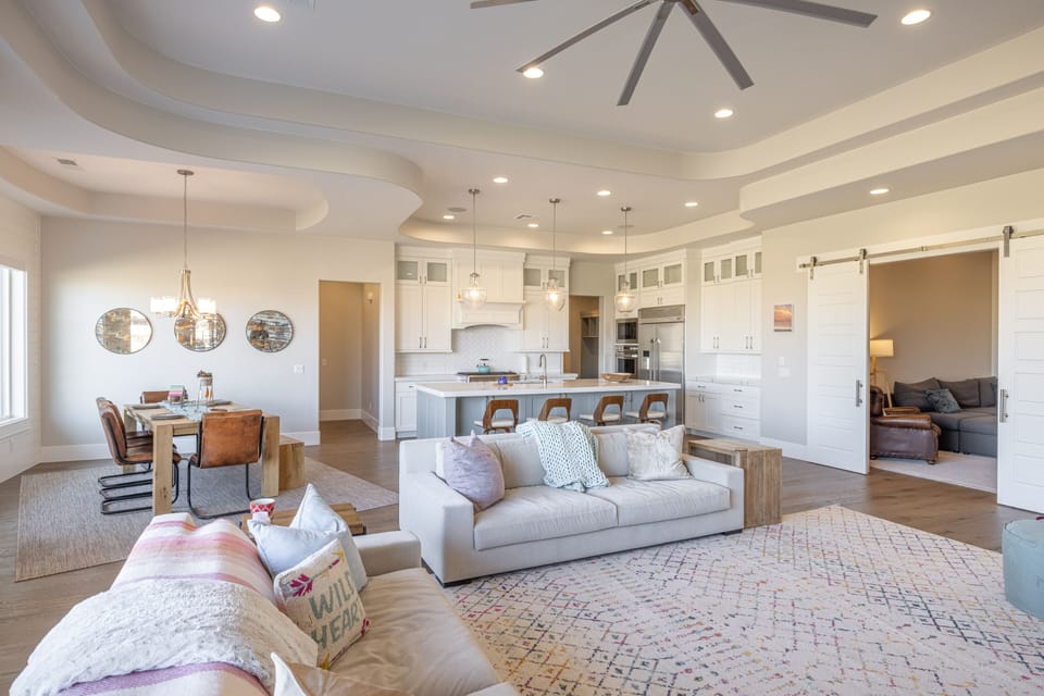 Living Room View - The Living Room is located adjacent to the dining room and is the perfect place to relax and watch your favorite movie or TV program.
