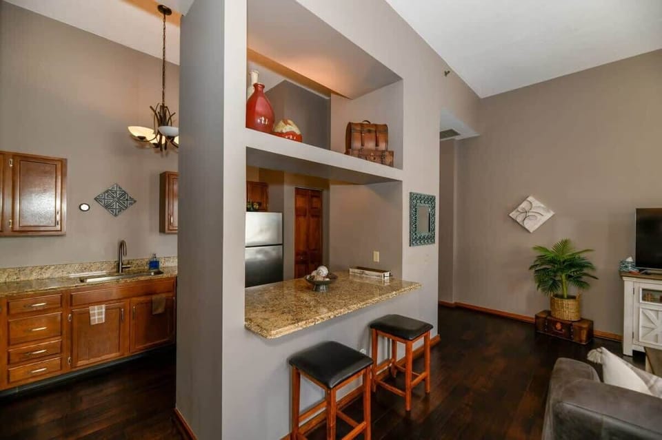 A modern kitchen with a sleek minibar—perfect for morning brews or evening cocktails. Whether you’re cooking up comfort or mixing up memories, this space is designed for ease, elegance, and a touch of indulgence all weekend long.