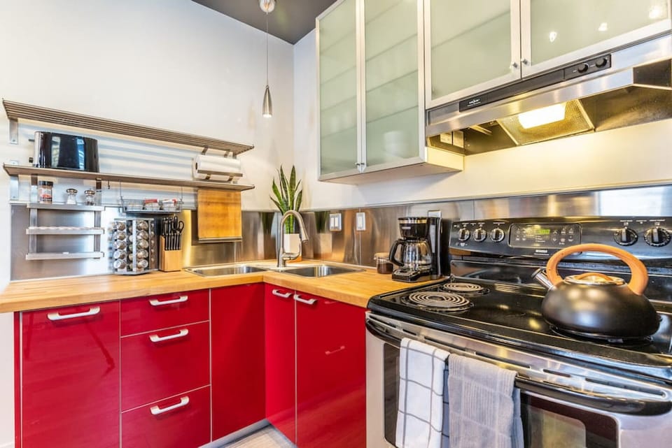 A coffee and tea maker is available for your morning brew, while the stove, microwave, and oven provide all the options for cooking or reheating your favorite dishes.