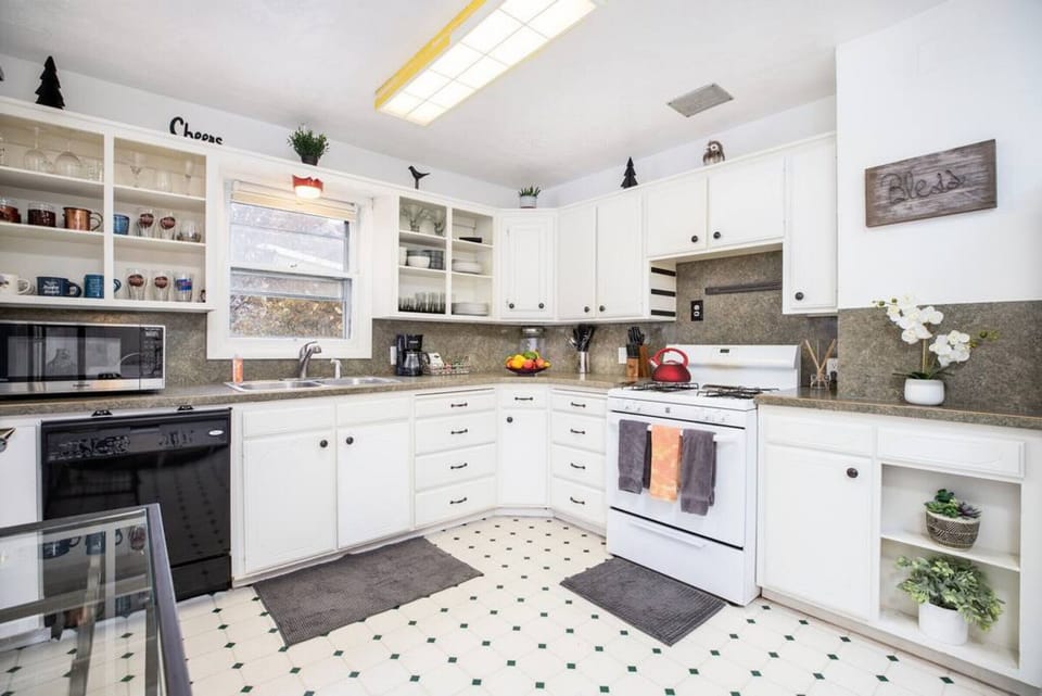 Fresh and clean kitchen designed with all the must-have essentials for easy cooking.