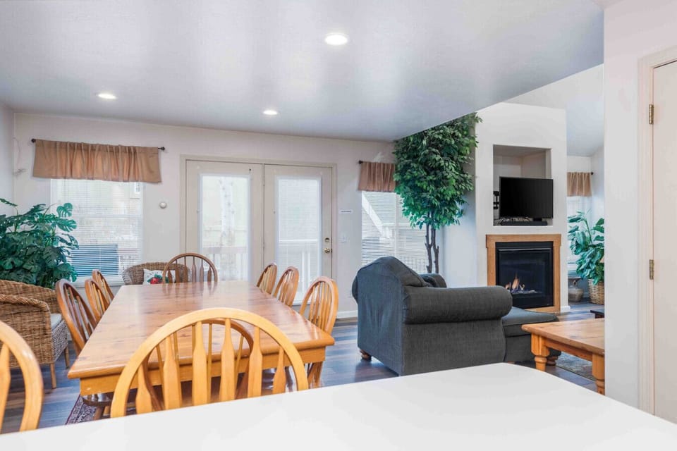 Gather around the table in a welcoming dining area.