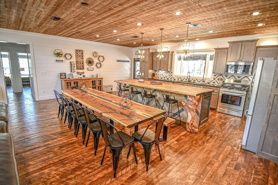 Custom made "river table" seats 13-15 guests.