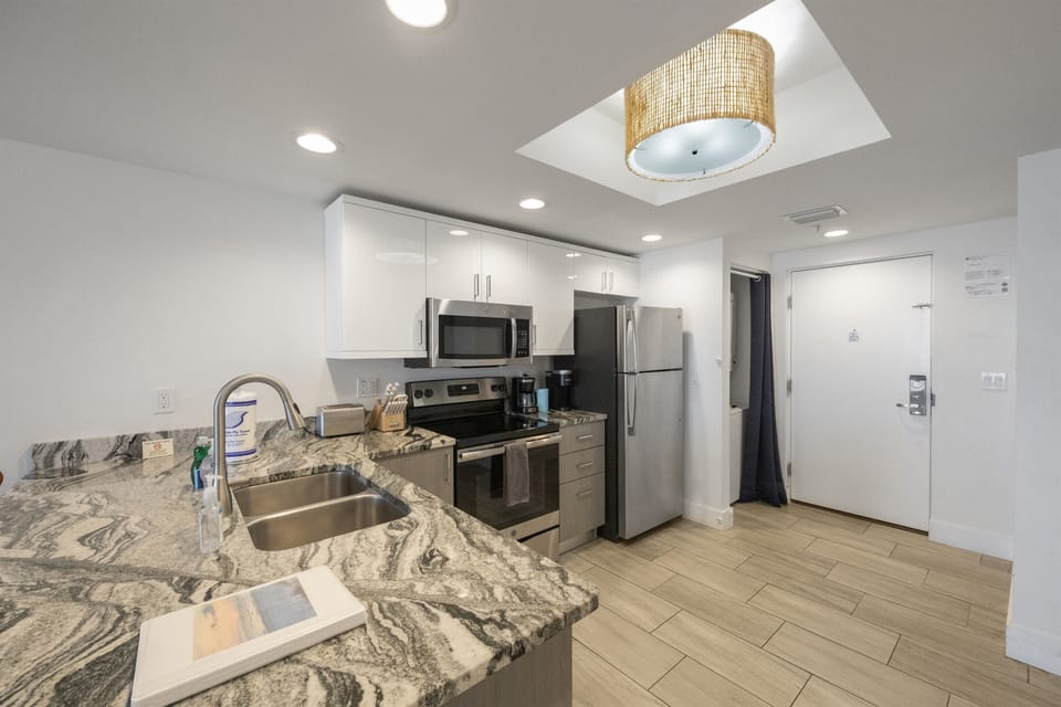 Kitchen, fully stocked with cooking/eating utensils
