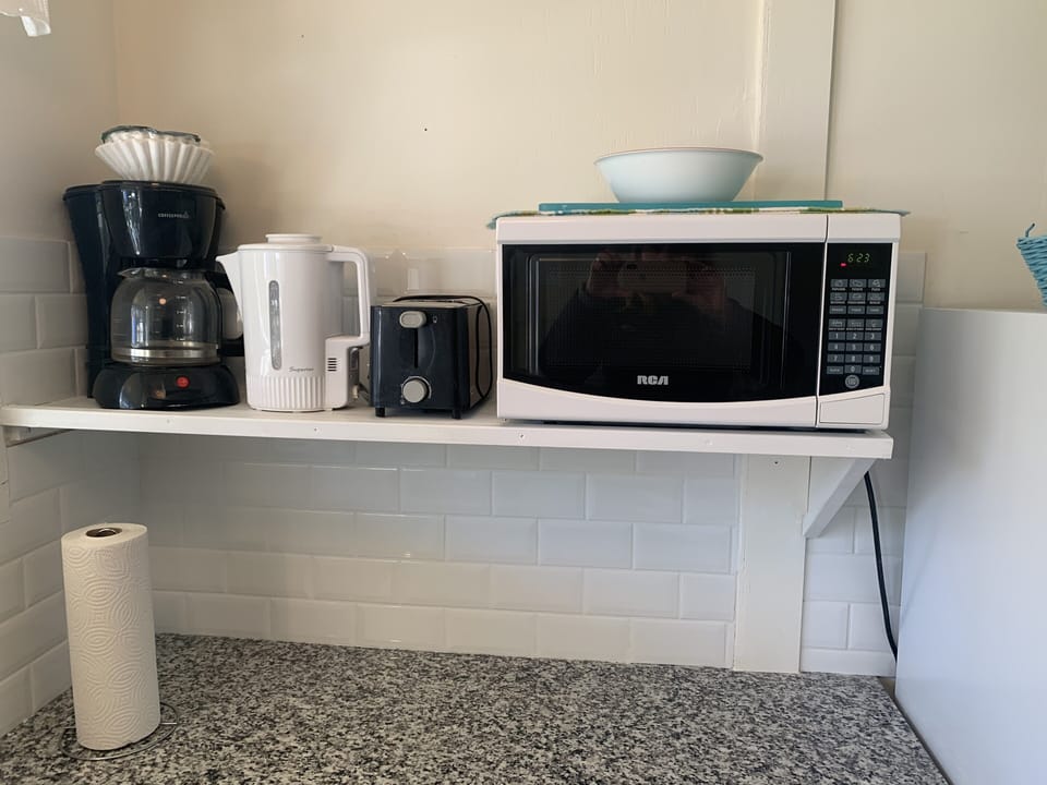 Cottage comes with microwave, kettle, coffee maker(filters provided) toaster