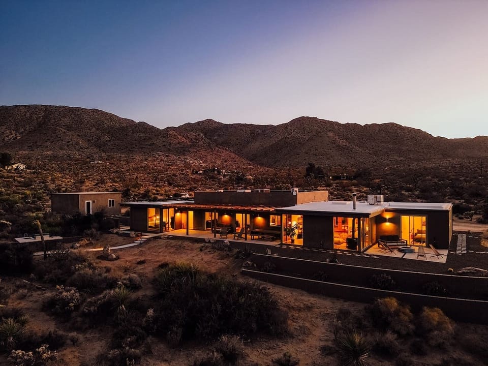 Beautiful desert home featuring spacious patio and open desert views.