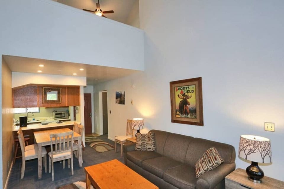 Cozy living room, dining area, and kitchen. Open area from kitchen keeping everyone in view and communication.