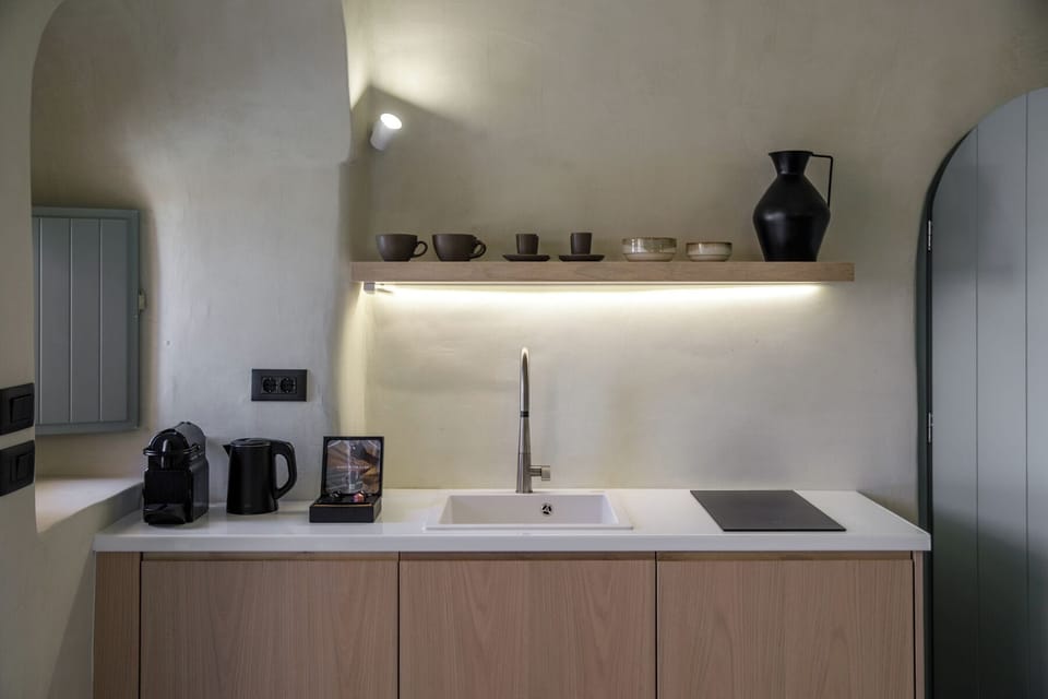 Kitchenette with coffee machine and kettle