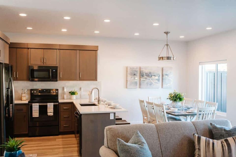 Open concept layout with family room open to kitchen and dining