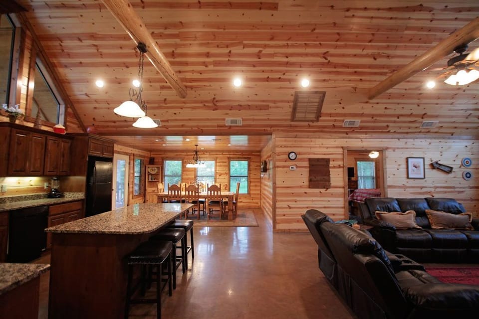 Spacious cabin kitchen and living area made for gathering, cooking, and relaxing together