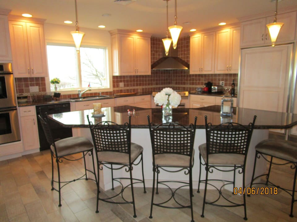 kitchen island and view to kitchen work area, view over marsh 
