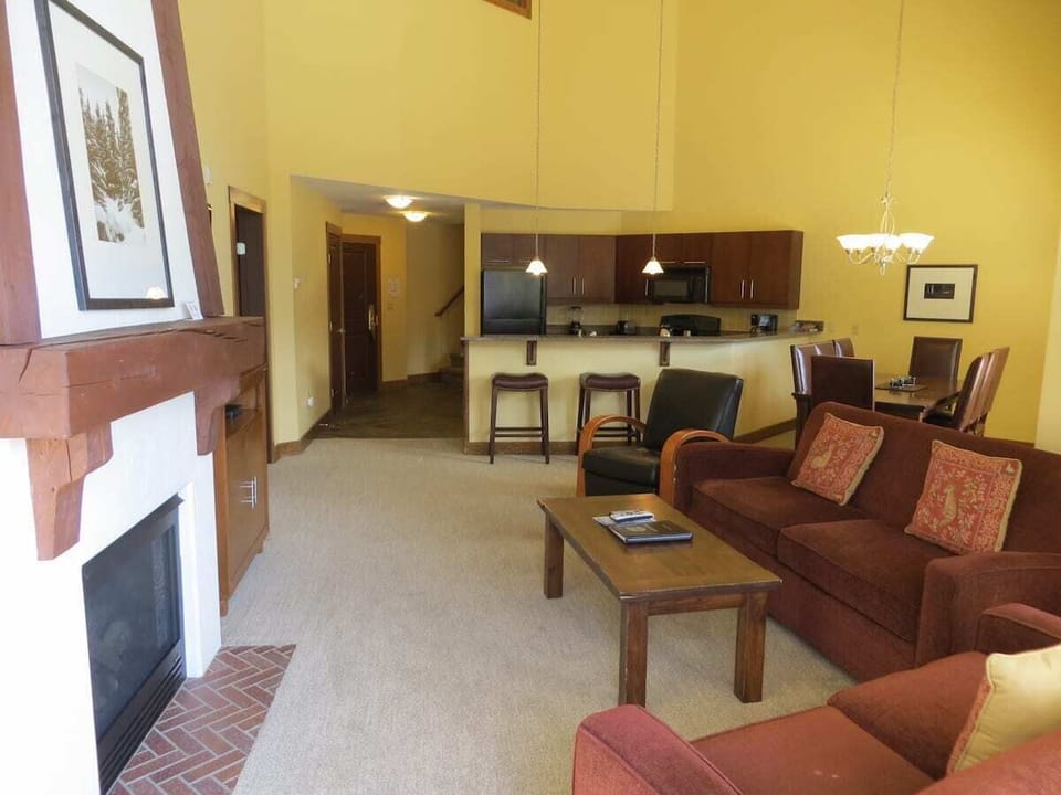 Two story open living area with plenty of seating.