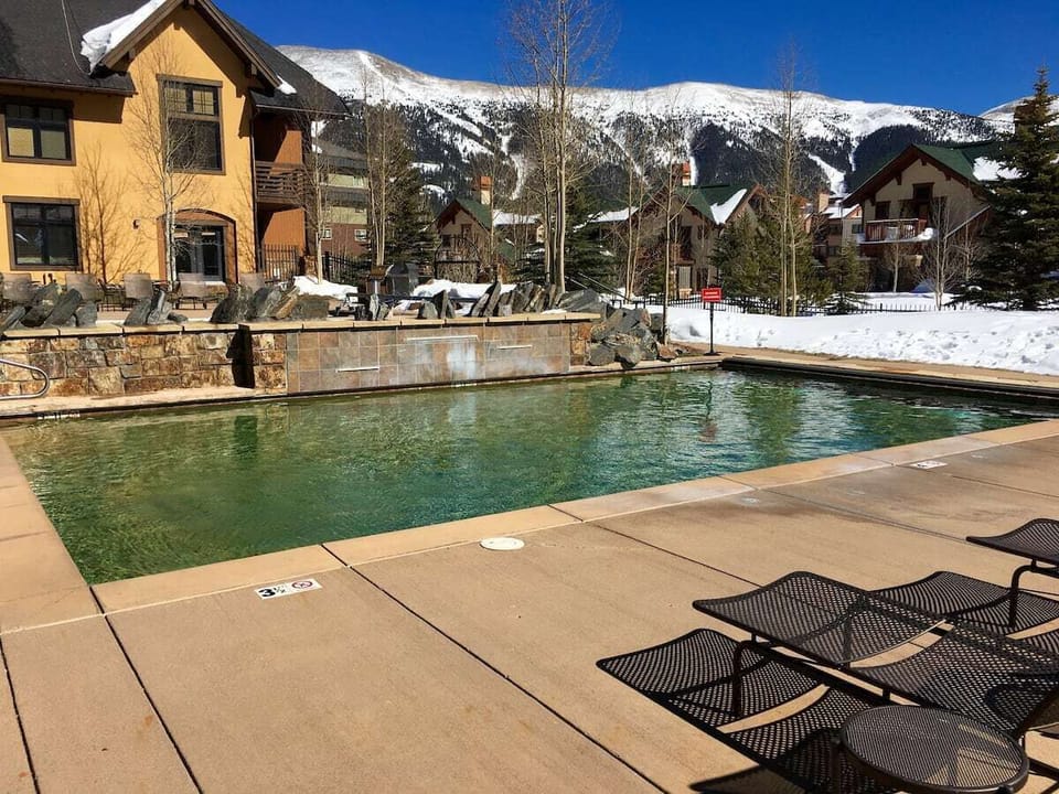 Pools, hot tub and fire pit share the same spectacular mountain views.