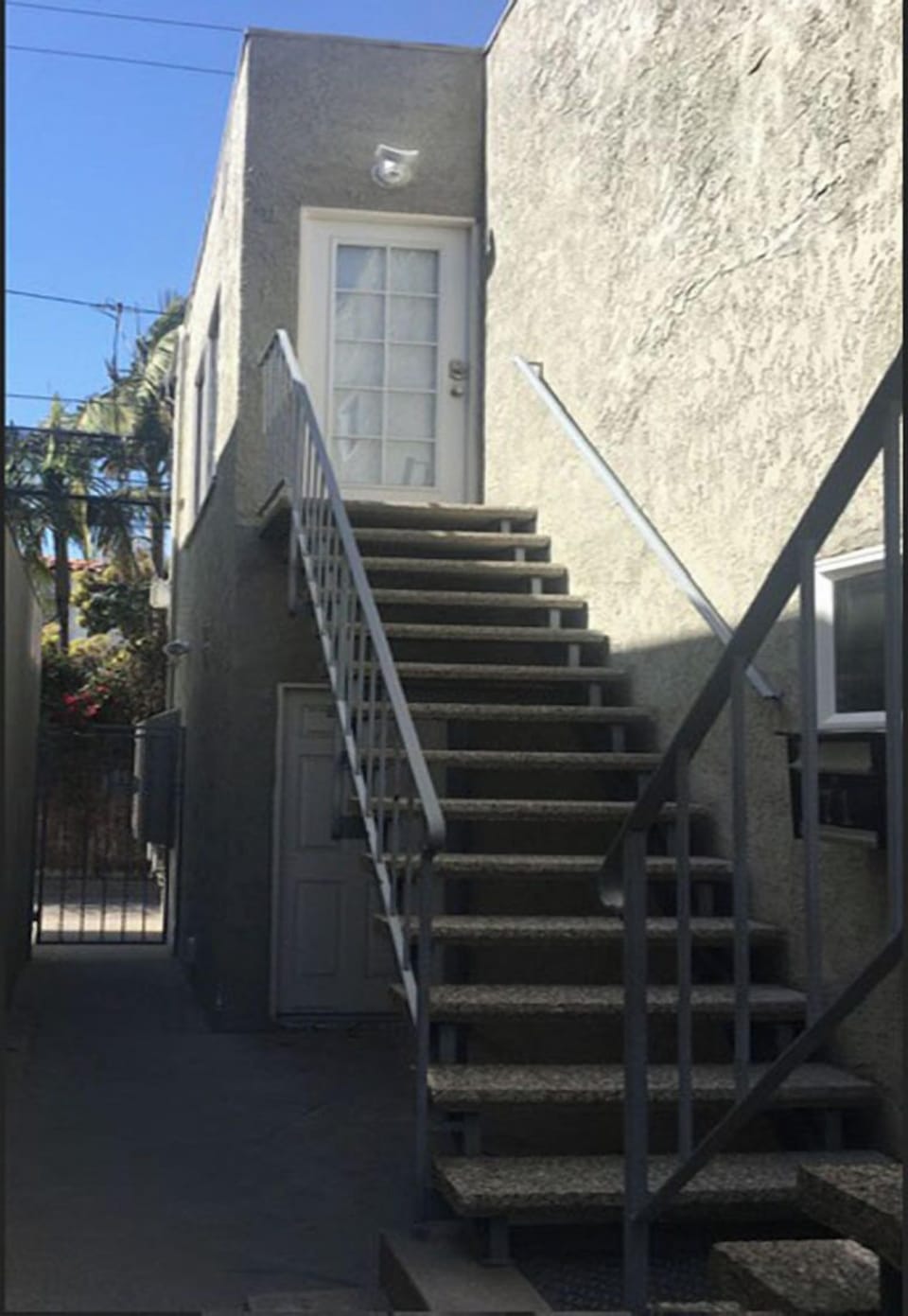 Stairs to apt facing away from the beach